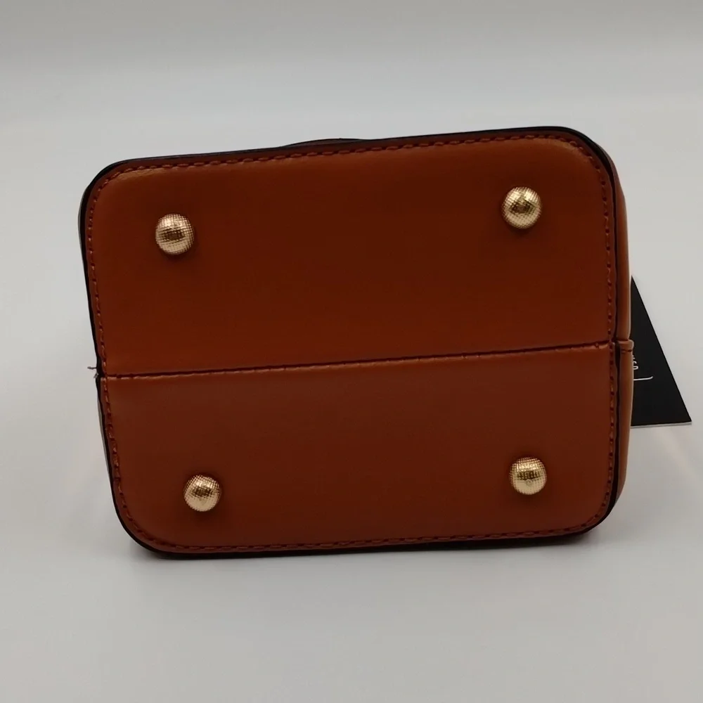 Sophisticated Brown Baby Bag with Gold Accents